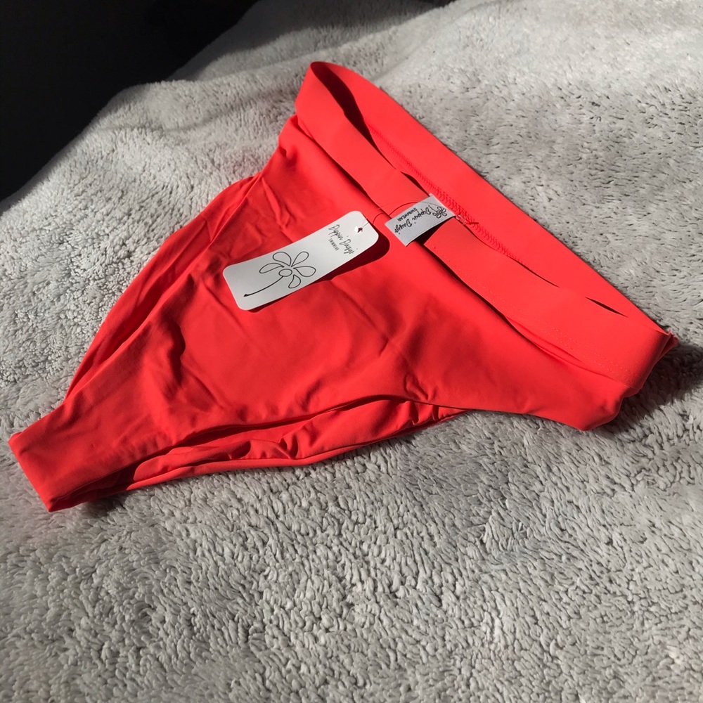 Dippin’ Daisy Ultra bottoms in Orange.